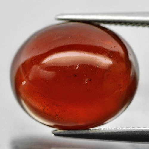 Reddish Orange Hessonite Garnet 9.81 Ct. Oval Cabochon 14 x 12 Mm. Natural Gem